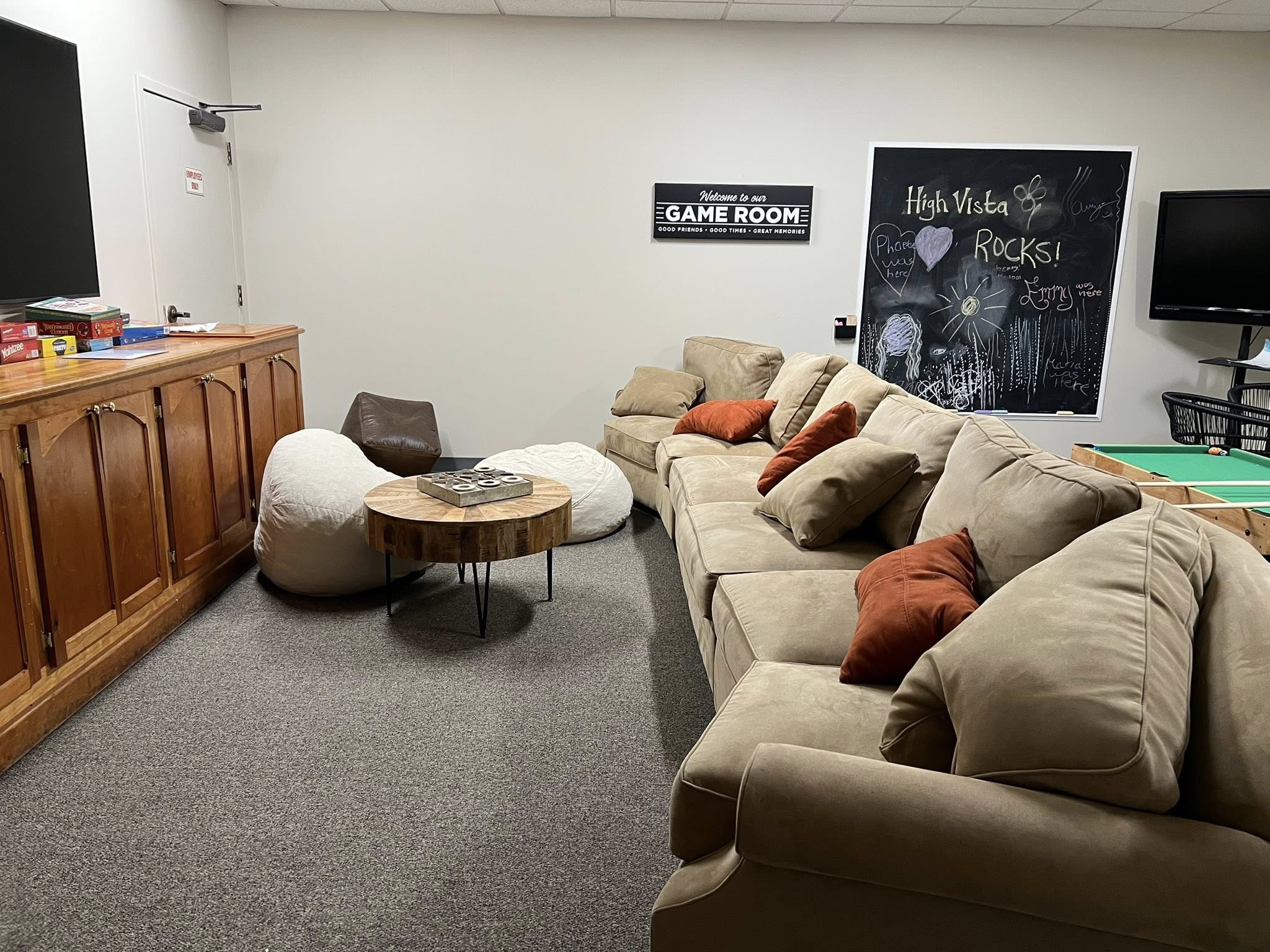 Game room seating and activities near The Robinson Pub